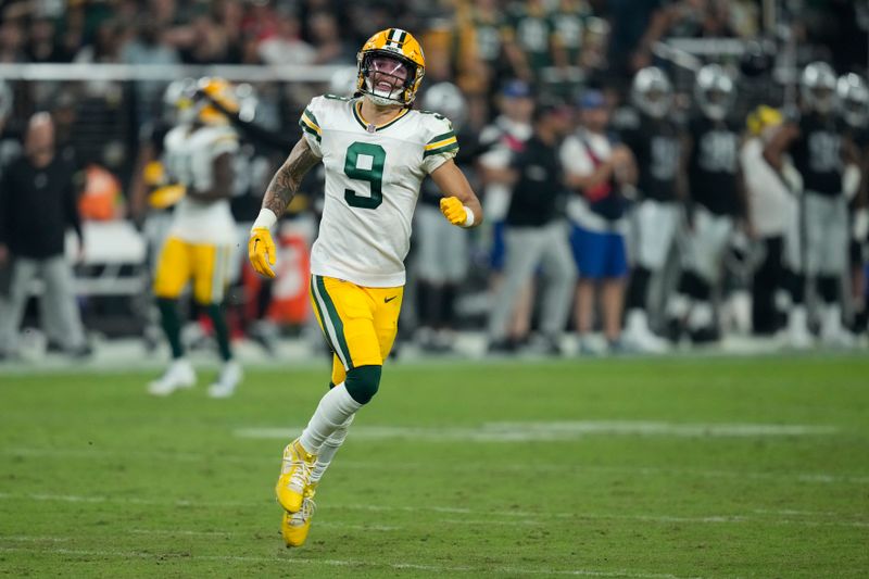 Green Bay Packers wide receiver Christian Watson (9) plays against the Las Vegas Raiders during an NFL football game, Monday, Oct. 9, 2023, in Las Vegas. (AP Photo/John Locher)