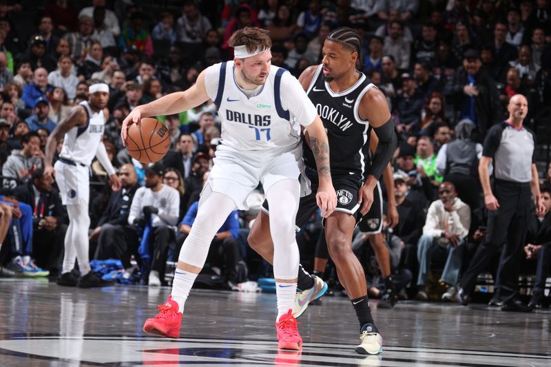 BROOKLYN, NY - FEBRUARY 6: Dennis Smith Jr. #4 of the Brooklyn Nets plays defense during the game  against Luka Doncic #77 of the Dallas Mavericks on February 6, 2024 at Barclays Center in Brooklyn, New York. NOTE TO USER: User expressly acknowledges and agrees that, by downloading and or using this Photograph, user is consenting to the terms and conditions of the Getty Images License Agreement. Mandatory Copyright Notice: Copyright 2024 NBAE (Photo by Nathaniel S. Butler/NBAE via Getty Images)