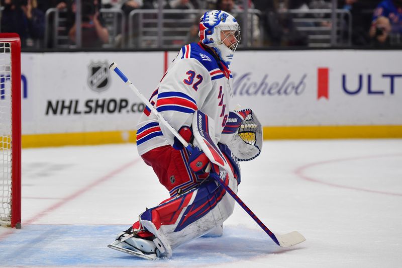 Jan 20, 2026; Los Angeles, California, USA; New York Rangers goaltender Jonathan Quick (32) defends the goal against the Los Angeles Kings during the second period at Crypto.com Arena. Mandatory Credit: Gary A. Vasquez-Imagn Images