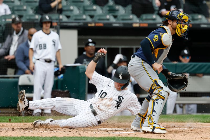 May 1, 2025; Chicago, Illinois, USA; Chicago White Sox shortstop Chase Meidroth (10) scores against the Milwaukee Brewers during the seventh inning at Rate Field. Mandatory Credit: Kamil Krzaczynski-Imagn Images