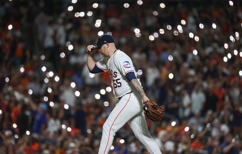 Aug 31, 2024; Houston, Texas, USA; Houston Astros relief pitcher Ryan Pressly (55) walks to the mound before the ninth inning against the Kansas City Royals at Minute Maid Park. Mandatory Credit: Troy Taormina-USA TODAY Sports