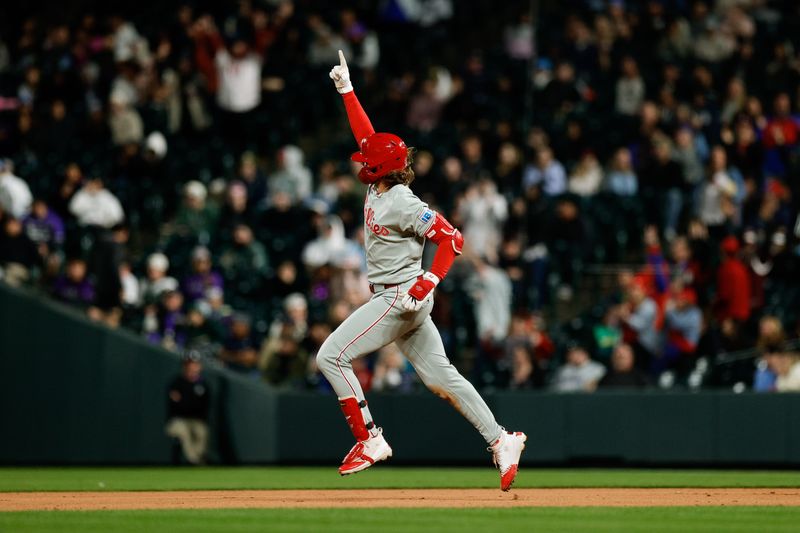 May 19, 2025; Denver, Colorado, USA; Philadelphia Phillies third baseman Alec Bohm (28) gestures as he rounds the bases on a two run home run in the eighth inning against the Colorado Rockies at Coors Field. Mandatory Credit: Isaiah J. Downing-Imagn Images