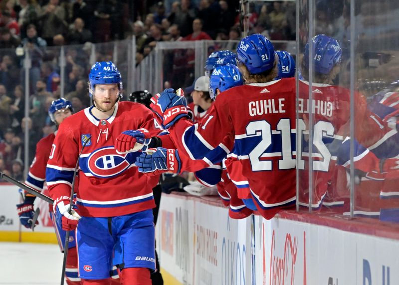 Apr 2, 2024; Montreal, Quebec, CAN; Montreal Canadiens forward Joel Armia (40) celebrates with teammates after scoring a goal against the Florida Panthers during the first period at the Bell Centre. Mandatory Credit: Eric Bolte-USA TODAY Sports