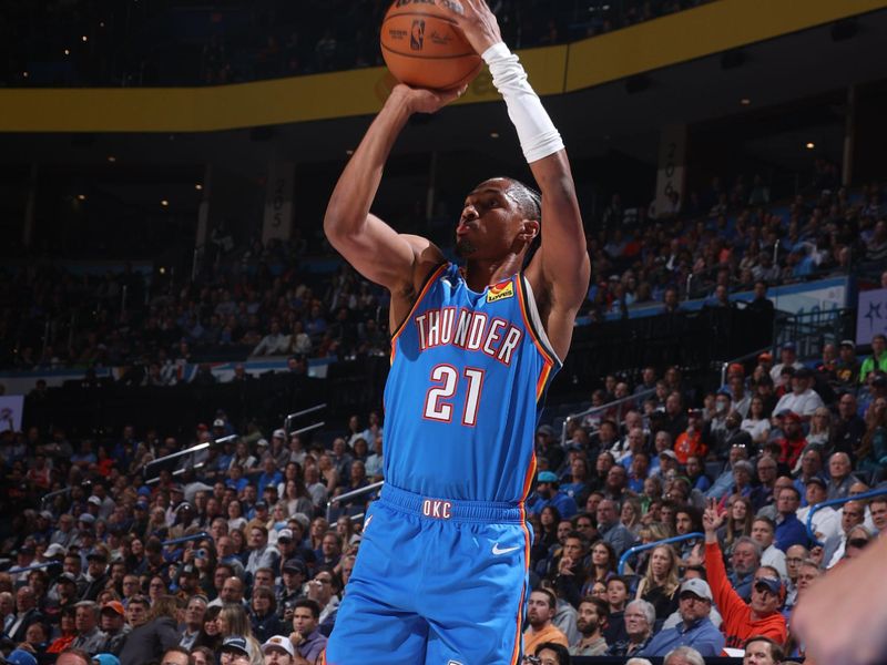 OKLAHOMA CITY, OK - NOVEMBER 13: Aaron Wiggins #21 of the Oklahoma City Thunder shoots a three point basket during the game against the New Orleans Pelicans on November 13, 2024 at Paycom Center in Oklahoma City, Oklahoma. NOTE TO USER: User expressly acknowledges and agrees that, by downloading and or using this photograph, User is consenting to the terms and conditions of the Getty Images License Agreement. Mandatory Copyright Notice: Copyright 2024 NBAE (Photo by Nathaniel S. Butler/NBAE via Getty Images)