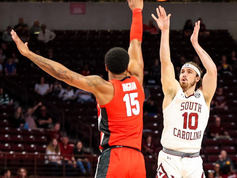 Mar 4, 2023; Columbia, South Carolina, USA; South Carolina Gamecocks forward Hayden Brown (10) shoots over Georgia Bulldogs forward Jailyn Ingram (15) in the first half at Colonial Life Arena. Mandatory Credit: Jeff Blake-USA TODAY Sports