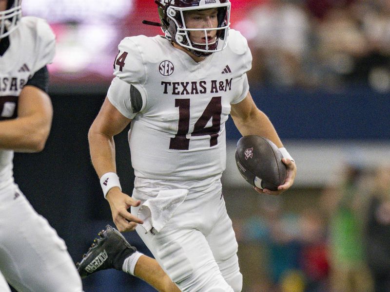 Sep 30, 2023; Arlington, Texas, USA; Texas A&M Aggies quarterback Max Johnson (14) in action during the game between the Texas A&M Aggies and the Arkansas Razorbacks at AT&T Stadium. Mandatory Credit: Jerome Miron-USA TODAY Sports