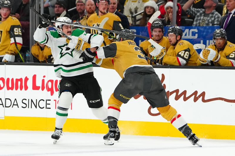 Dec 6, 2024; Las Vegas, Nevada, USA; Vegas Golden Knights defenseman Brayden McNabb (3) checks Dallas Stars left wing Mason Marchment (27) during the first period at T-Mobile Arena. Mandatory Credit: Stephen R. Sylvanie-Imagn Images