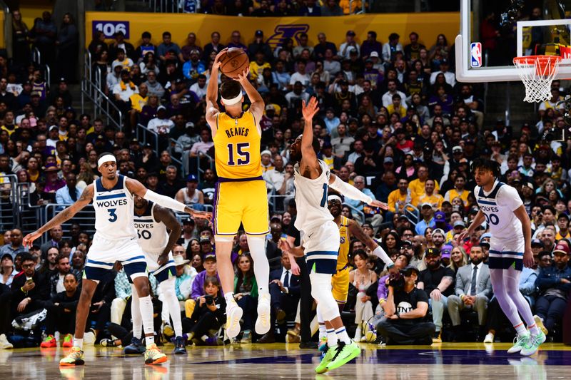LOS ANGELES, CA - APRIL 22: Austin Reaves #15 of the Los Angeles Lakers shoots the ball during the game against the Minnesota Timberwolves  during Round 1 Game 2 of the 2025 NBA Playoffs on April 22, 2025 at Crypto.Com Arena in Los Angeles, California. NOTE TO USER: User expressly acknowledges and agrees that, by downloading and/or using this Photograph, user is consenting to the terms and conditions of the Getty Images License Agreement. Mandatory Copyright Notice: Copyright 2025 NBAE (Photo by Adam Pantozzi/NBAE via Getty Images)