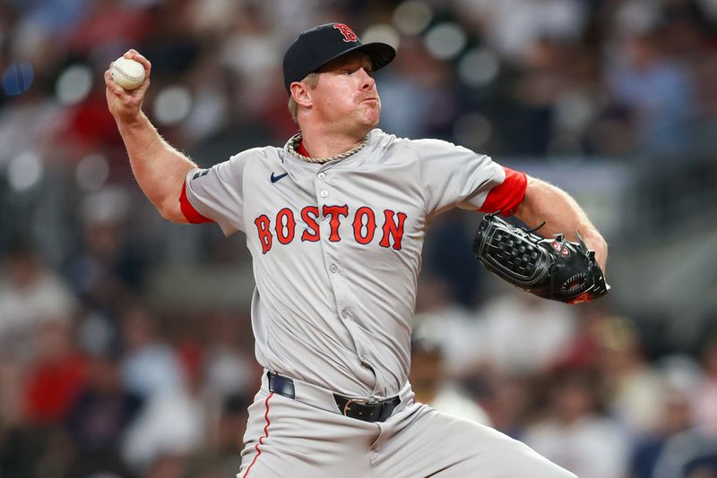 May 8, 2024; Atlanta, Georgia, USA; Boston Red Sox relief pitcher Chase Anderson (48) throws against the Atlanta Braves in the eighth inning at Truist Park. Mandatory Credit: Brett Davis-USA TODAY Sports