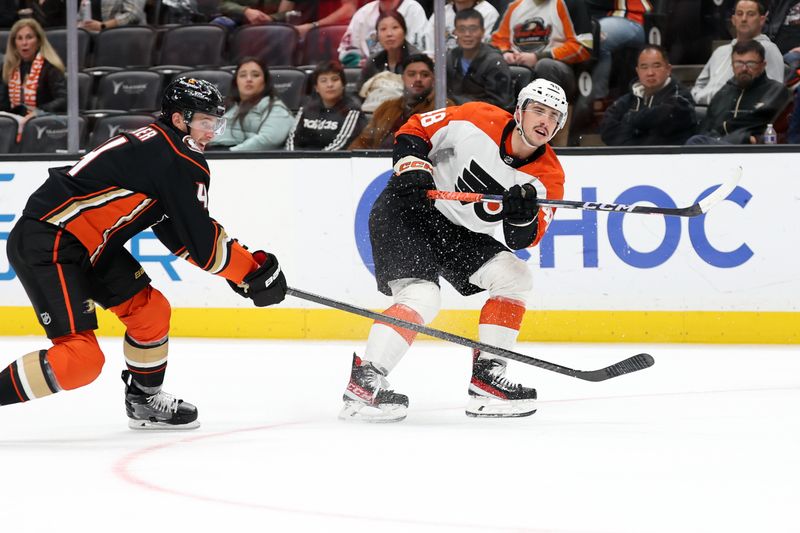 Nov 10, 2023; Anaheim, California, USA; Philadelphia Flyers center Morgan Frost (48) passes the puck during the third period against the Anaheim Ducks at Honda Center. Mandatory Credit: Kiyoshi Mio-USA TODAY Sports