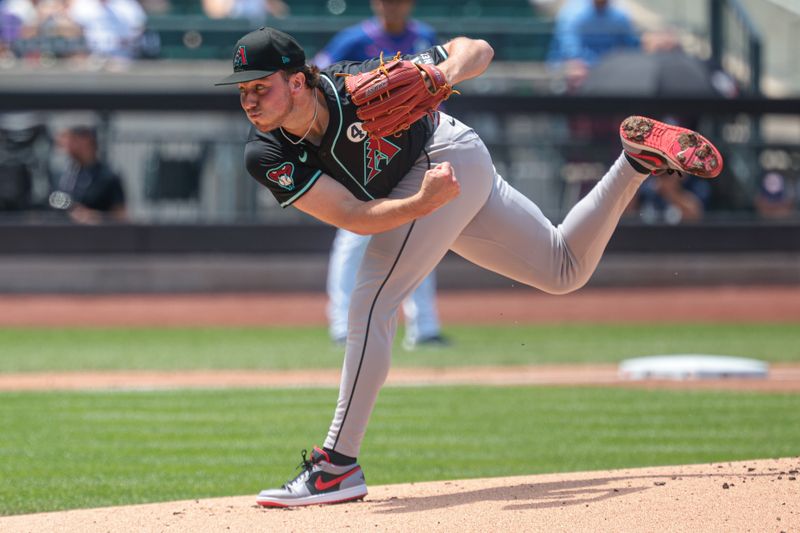 Jun 2, 2024; New York City, New York, USA;  Arizona Diamondbacks starting pitcher Brandon Pfaadt (32) delivers a pitch during the first inning against the New York Mets at Citi Field. Mandatory Credit: Vincent Carchietta-USA TODAY Sports