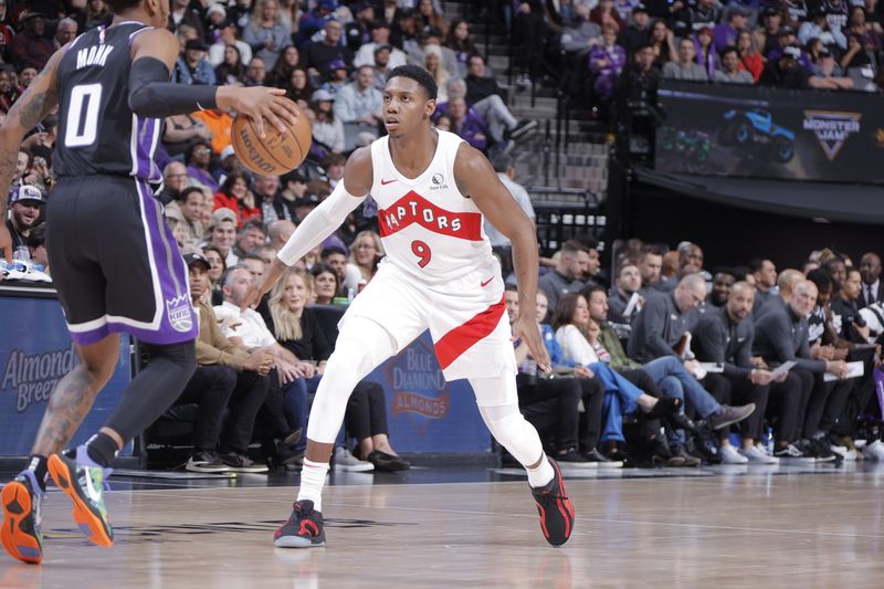 SACRAMENTO, CA - JANUARY 5: RJ Barrett #9 of the Toronto Raptors plays defense against Malik Monk #0 of the Sacramento Kings during the game on January 5, 2024 at Golden 1 Center in Sacramento, California. NOTE TO USER: User expressly acknowledges and agrees that, by downloading and or using this Photograph, user is consenting to the terms and conditions of the Getty Images License Agreement. Mandatory Copyright Notice: Copyright 2024 NBAE (Photo by Rocky Widner/NBAE via Getty Images)