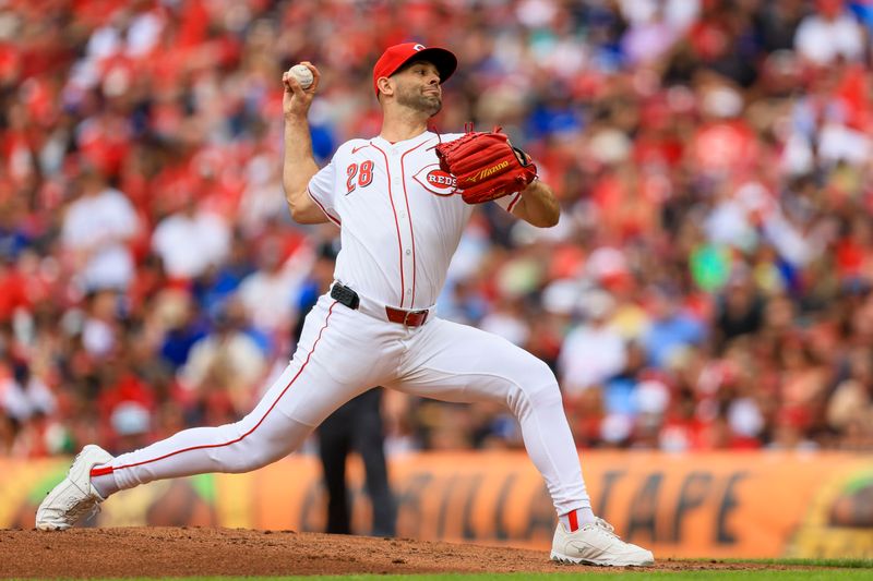 May 26, 2024; Cincinnati, Ohio, USA; Cincinnati Reds relief pitcher Nick Martinez (28) pitches against the Los Angeles Dodgers in the second inning at Great American Ball Park. Mandatory Credit: Katie Stratman-USA TODAY Sports