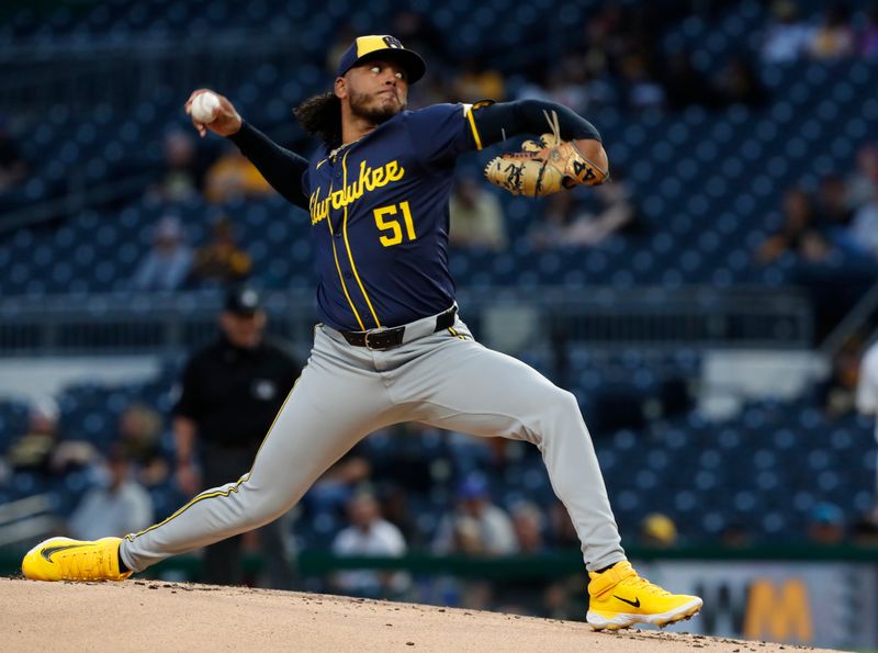 Sep 25, 2024; Pittsburgh, Pennsylvania, USA;  Milwaukee Brewers starting pitcher Freddy Peralta (51) delivers a pitch against the Pittsburgh Pirates during the first inning at PNC Park. Mandatory Credit: Charles LeClaire-Imagn Images