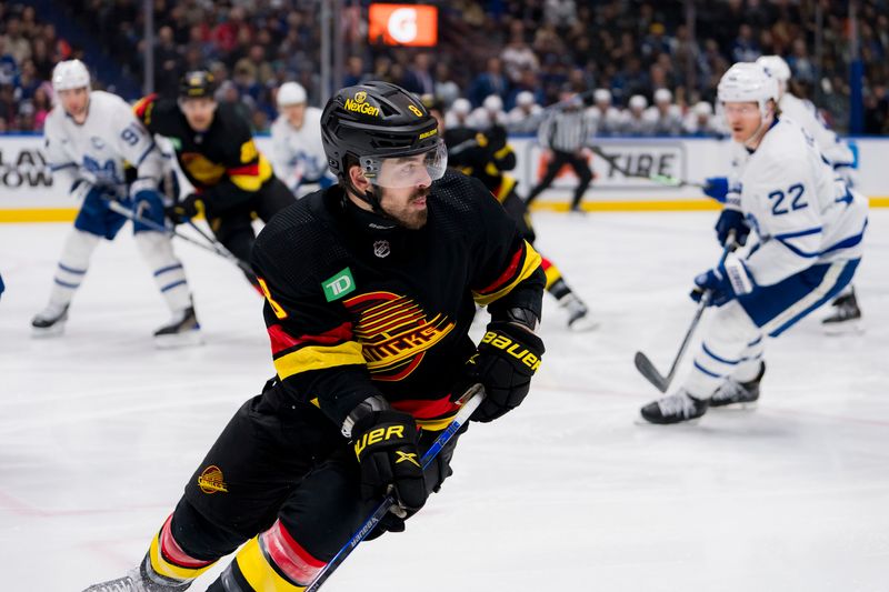 Jan 20, 2024; Vancouver, British Columbia, CAN; Vancouver Canucks forward Conor Garland (8) skates against the Toronto Maple Leafs in the first period at Rogers Arena. Mandatory Credit: Bob Frid-USA TODAY Sports