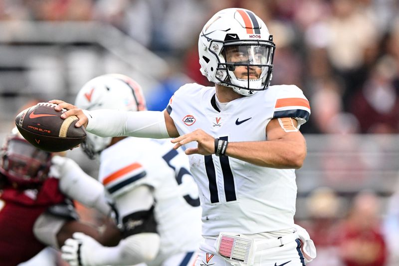 Sep 30, 2023; Chestnut Hill, Massachusetts, USA; Virginia Cavaliers quarterback Tony Muskett (11) passes the ball against the Boston College Eagles during the second half at Alumni Stadium. Mandatory Credit: Brian Fluharty-USA TODAY Sports