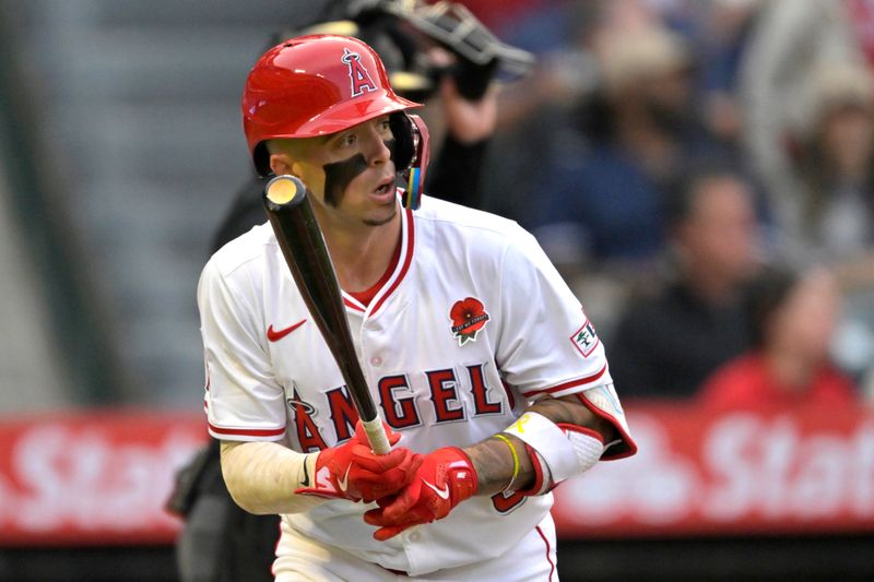 May 26, 2025; Anaheim, California, USA;  Los Angeles Angels shortstop Zach Neto (9) hits a solo home run in the first inning against the New York Yankees at Angel Stadium. Mandatory Credit: Jayne Kamin-Oncea-Imagn Images