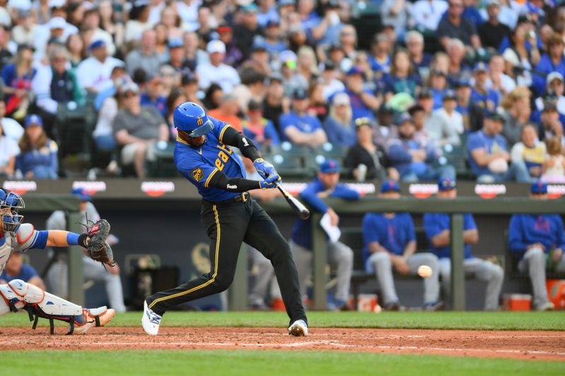 Aug 11, 2024; Seattle, Washington, USA; Seattle Mariners center fielder Victor Robles (10) hits a 2-RBI single against the New York Mets during the sixth inning at T-Mobile Park. Mandatory Credit: Steven Bisig-USA TODAY Sports