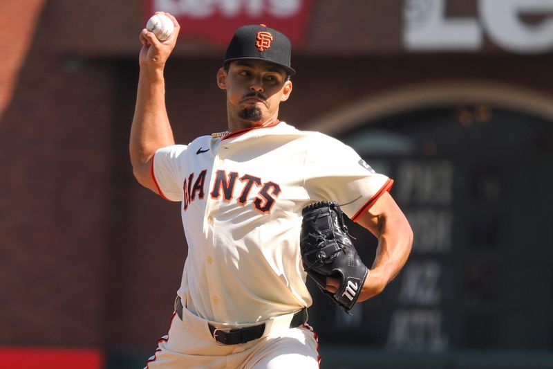 Apr 5, 2024; San Francisco, California, USA; San Francisco Giants starting pitcher Jordan Hicks (12) pitches the ball against the San Diego Padres during the seventh inning at Oracle Park. Mandatory Credit: Kelley L Cox-USA TODAY Sports