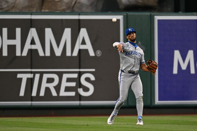 May 11, 2024; Anaheim, California, USA; Kansas City Royals outfielder MJ Melendez (1) fields the ball against the Los Angeles Angels during the fifth inning at Angel Stadium. Mandatory Credit: Jonathan Hui-USA TODAY Sports