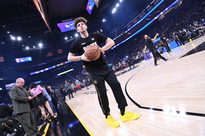 SAN FRANCISCO, CA - MARCH 7:  Brandin Podziemski #2 of the Golden State Warriors looks on before the game against the Chicago Bulls on March 7, 2024 at Chase Center in San Francisco, California. NOTE TO USER: User expressly acknowledges and agrees that, by downloading and or using this photograph, user is consenting to the terms and conditions of Getty Images License Agreement. Mandatory Copyright Notice: Copyright 2024 NBAE (Photo by Noah Graham/NBAE via Getty Images)