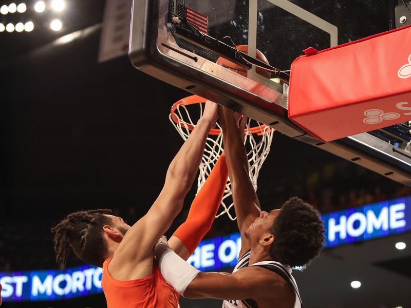 Jan 14, 2025; Atlanta, Georgia, USA; Georgia Tech Yellow Jackets guard Jaeden Mustaf (3) shoots the ball against Clemson Tigers center Christian Reeves (14) during the first half at McCamish Pavilion. Mandatory Credit: Jordan Godfree-Imagn Images