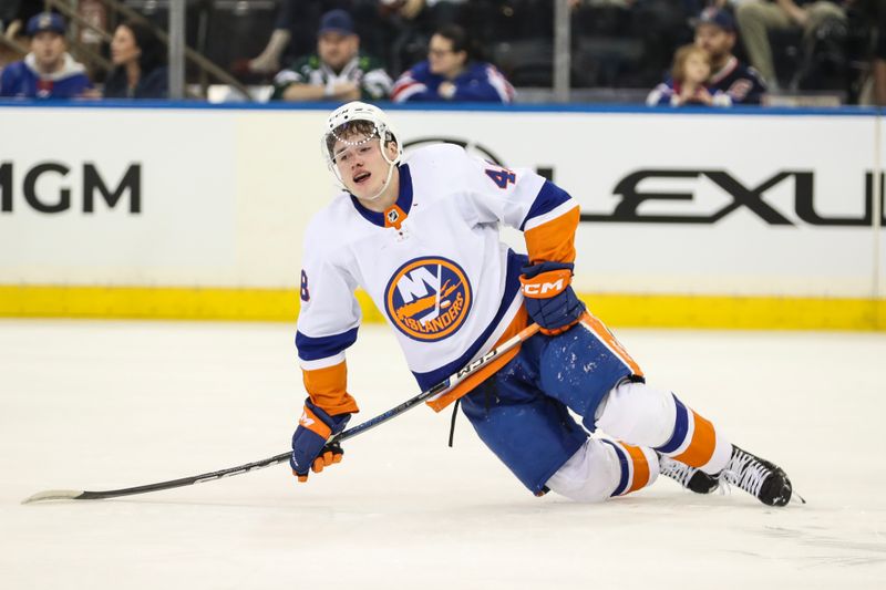 Sep 26, 2023; New York, New York, USA;  New York Islanders forward Matthew Maggio (48) attempts to get up after an injury in the first period against the New York Rangers at Madison Square Garden. Mandatory Credit: Wendell Cruz-USA TODAY Sports