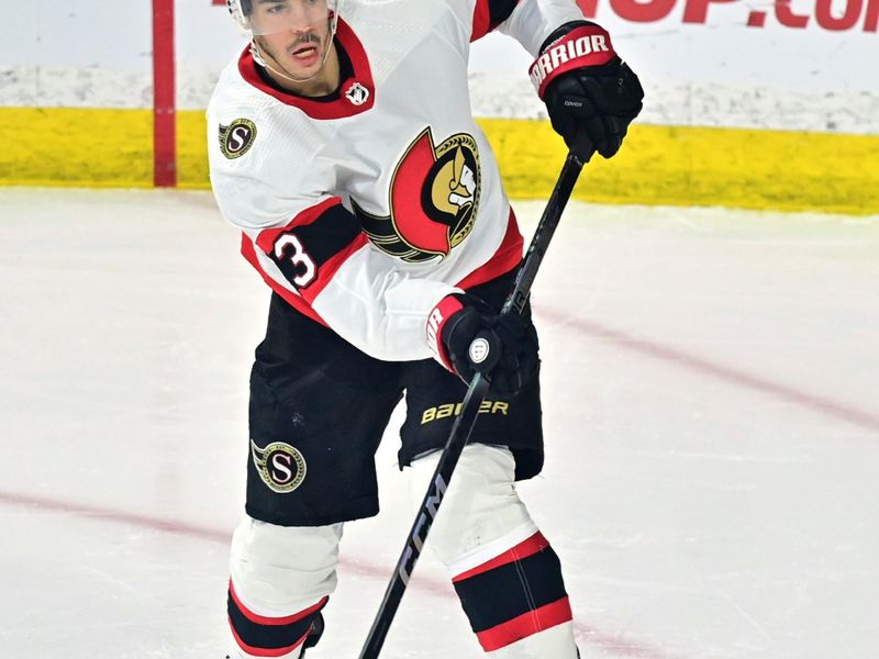 Dec 19, 2023; Tempe, Arizona, USA; Ottawa Senators defenseman Travis Hamonic (23) passes the puck in the first period against the Arizona Coyotes at Mullett Arena. Mandatory Credit: Matt Kartozian-USA TODAY Sports