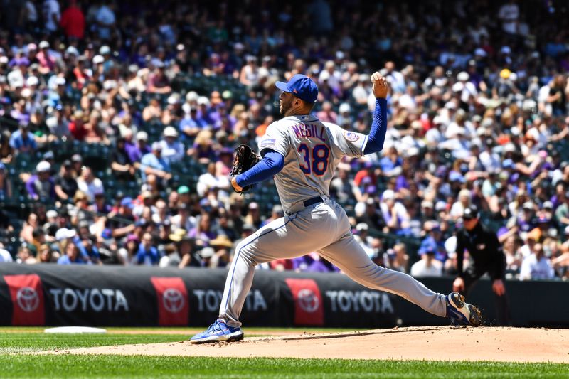 May 28, 2023; Denver, Colorado, USA; New York Mets starting pitcher Tylor Megill (38) delivers a pitch in the first inning against the Colorado Rockies at Coors Field. Mandatory Credit: John Leyba-USA TODAY Sports