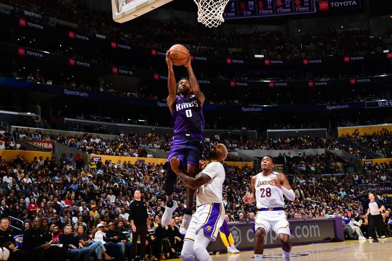 LOS ANGELES, CA - OCTOBER 26: Malik Monk #0 of the Sacramento Kings drives to the basket during the game against the Los Angeles Lakers on October 26, 2024 at Crypto.Com Arena in Los Angeles, California. NOTE TO USER: User expressly acknowledges and agrees that, by downloading and/or using this Photograph, user is consenting to the terms and conditions of the Getty Images License Agreement. Mandatory Copyright Notice: Copyright 2024 NBAE (Photo by Adam Pantozzi/NBAE via Getty Images)