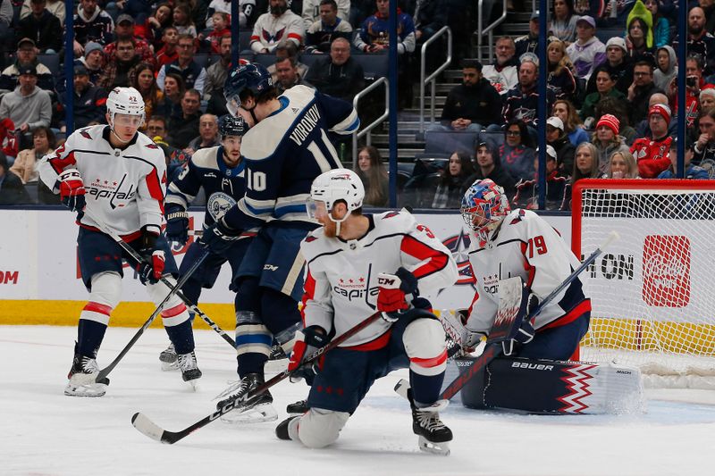 Dec 21, 2023; Columbus, Ohio, USA; Washington Capitals goalie Charlie Lindgren (79) makes a save against the Columbus Blue Jackets during the first period at Nationwide Arena. Mandatory Credit: Russell LaBounty-USA TODAY Sports