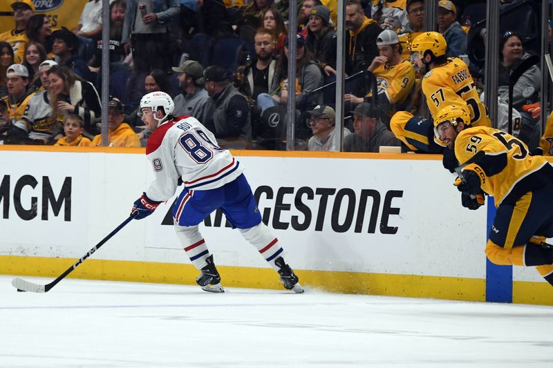 Mar 5, 2024; Nashville, Tennessee, USA; Montreal Canadiens right wing Joshua Roy (89) skates past Nashville Predators defenseman Roman Josi (59) before scoring during the third period at Bridgestone Arena. Mandatory Credit: Christopher Hanewinckel-USA TODAY Sports