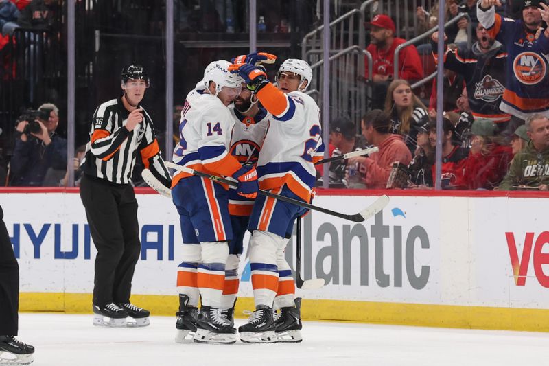 Nov 10, 2025; Newark, New Jersey, USA; New York Islanders center Bo Horvat (14) celebrates his goal against the New Jersey Devils during the second period at Prudential Center. Mandatory Credit: Ed Mulholland-Imagn Images