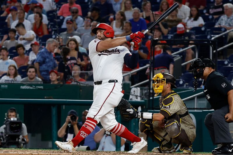 Jul 23, 2024; Washington, District of Columbia, USA; Washington Nationals first baseman Juan Yepez (18) doubles against the San Diego Padres during the eighth inning at Nationals Park. Mandatory Credit: Geoff Burke-USA TODAY Sports