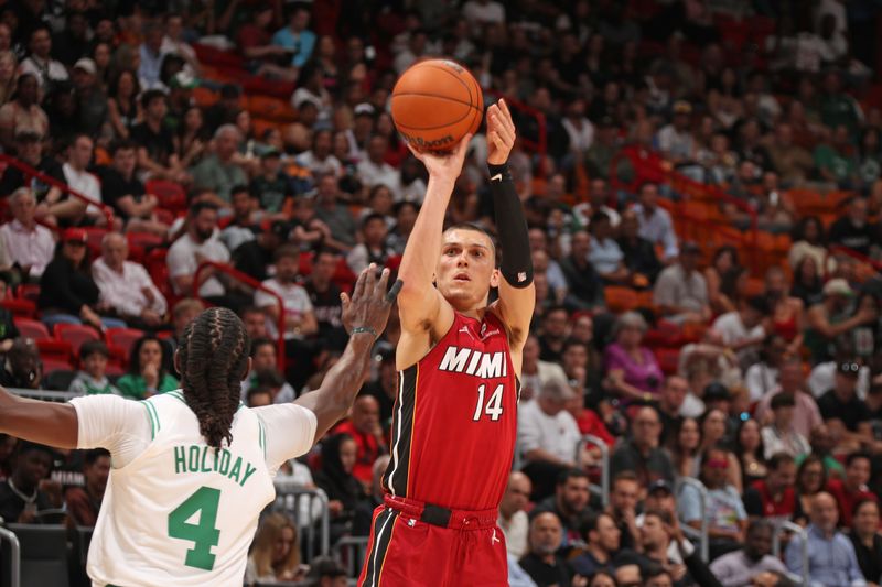 MIAMI, FL - MARCH 14: Tyler Herro #14 of the Miami Heat shoots the ball during the game against the Boston Celtics on March 14, 2025 at Kaseya Center in Miami, Florida. NOTE TO USER: User expressly acknowledges and agrees that, by downloading and or using this Photograph, user is consenting to the terms and conditions of the Getty Images License Agreement. Mandatory Copyright Notice: Copyright 2025 NBAE (Photo by Issac Baldizon/NBAE via Getty Images)