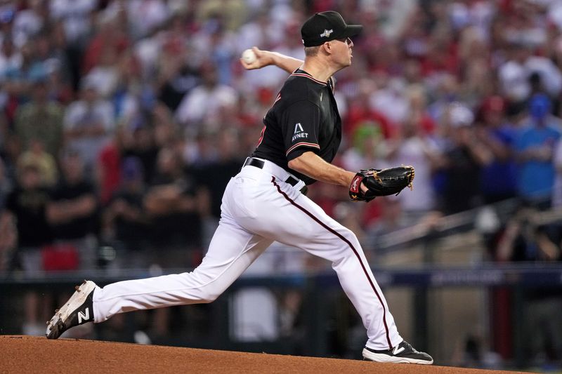 Oct 20, 2023; Phoenix, Arizona, USA; Arizona Diamondbacks relief pitcher Joe Mantiply (35) pitches during the first inning against the Philadelphia Phillies in game four of the NLCS for the 2023 MLB playoffs at Chase Field. Mandatory Credit: Joe Camporeale-USA TODAY Sports