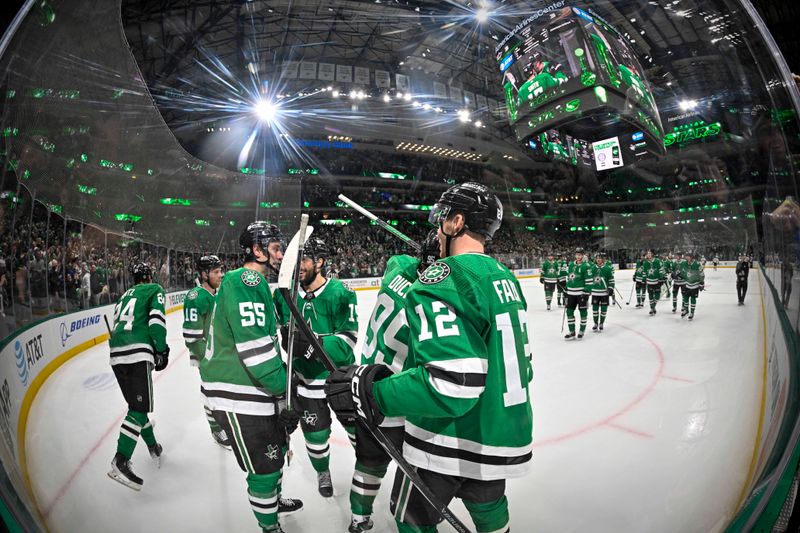 Jan 25, 2024; Dallas, Texas, USA; Dallas Stars defenseman Thomas Harley (55) and center Craig Smith (15) and center Matt Duchene (95) and center Radek Faksa (12) celebrate Harley s game winning goal after the Stars defeat the Anaheim Ducks in the overtime period at the American Airlines Center. Mandatory Credit: Jerome Miron-USA TODAY Sports