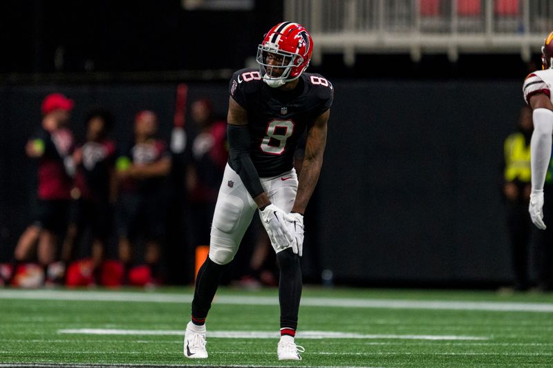 Atlanta Falcons tight end Kyle Pitts (8) lines up during the second half of an NFL football game against the Washington Commanders, Sunday, Oct. 15, 2023, in Atlanta. The Washington Commanders won 24-16. (AP Photo/Danny Karnik)