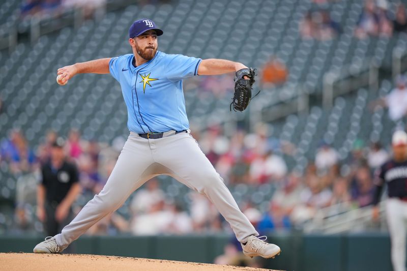 Jun 18, 2024; Minneapolis, Minnesota, USA; Tampa Bay Rays pitcher Aaron Civale (34) pitches against the Minnesota Twins in the first inning at Target Field. Mandatory Credit: Brad Rempel-USA TODAY Sports