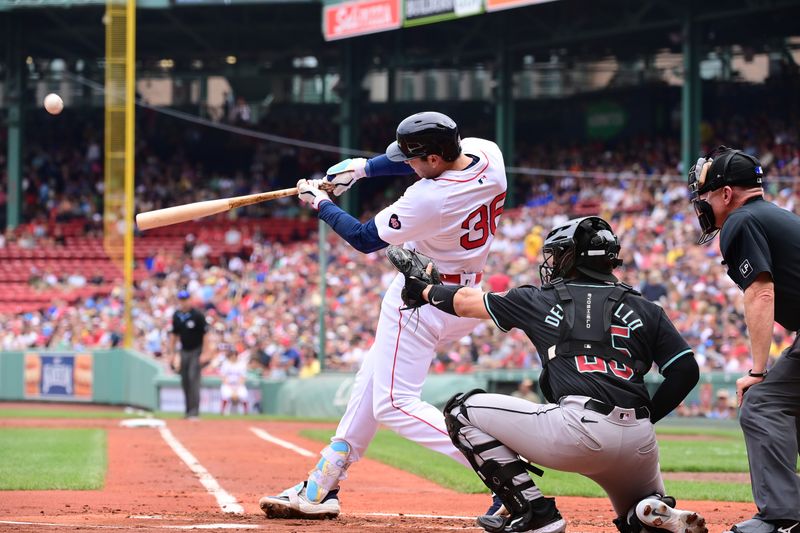 Aug 25, 2024; Boston, Massachusetts, USA; Boston Red Sox first baseman Triston Casas (36) hits a home run against the Arizona Diamondbacks during the first inning at Fenway Park. Mandatory Credit: Eric Canha-USA TODAY Sports