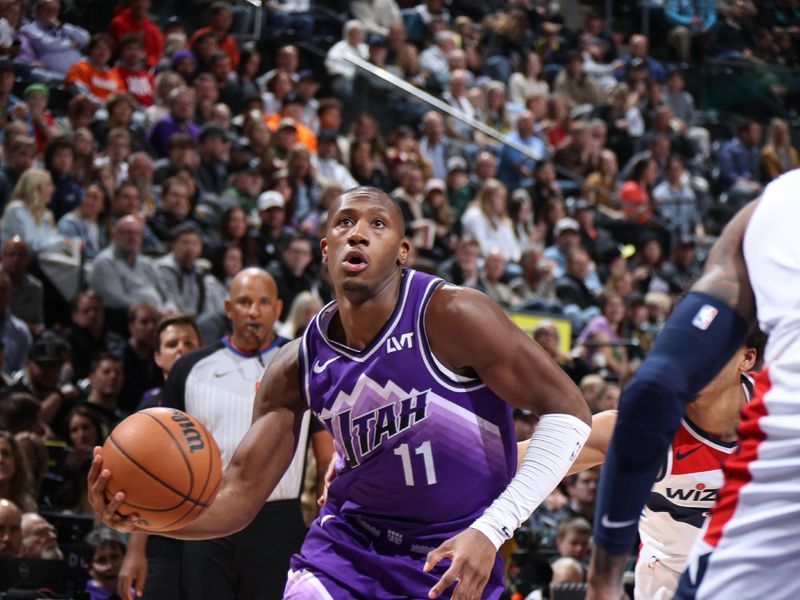 SALT LAKE CITY, UT - MARCH 4:  Kris Dunn #11 of the Utah Jazz drives to the basket during the game against the Washington Wizards on March 4, 2024 at vivint.SmartHome Arena in Salt Lake City, Utah. NOTE TO USER: User expressly acknowledges and agrees that, by downloading and or using this Photograph, User is consenting to the terms and conditions of the Getty Images License Agreement. Mandatory Copyright Notice: Copyright 2024 NBAE (Photo by Melissa Majchrzak/NBAE via Getty Images)