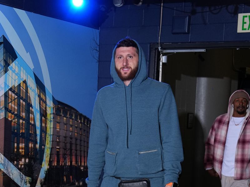 DENVER, CO - MARCH 5: Jusuf Nurkic #20 of the Phoenix Suns arrives to the arena before the game against the Denver Nuggets on March 5, 2024 at the Ball Arena in Denver, Colorado. NOTE TO USER: User expressly acknowledges and agrees that, by downloading and/or using this Photograph, user is consenting to the terms and conditions of the Getty Images License Agreement. Mandatory Copyright Notice: Copyright 2024 NBAE (Photo by Garrett Ellwood/NBAE via Getty Images)