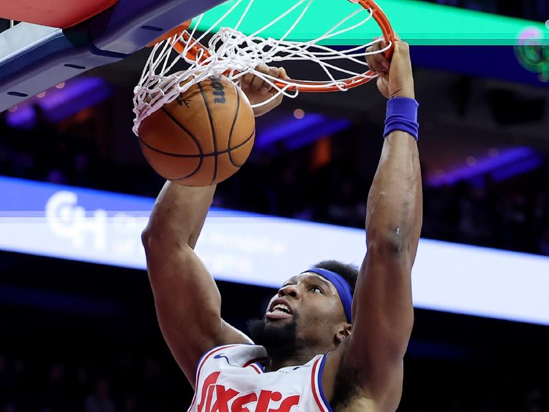 PHILADELPHIA, PENNSYLVANIA - JANUARY 28: Guerschon Yabusele #28 of the Philadelphia 76ers dunks the ball during the first half against the Los Angeles Lakers at the Wells Fargo Center on January 28, 2025 in Philadelphia, Pennsylvania. NOTE TO USER: User expressly acknowledges and agrees that, by downloading and or using this photograph, User is consenting to the terms and conditions of the Getty Images License Agreement. (Photo by Emilee Chinn/Getty Images)