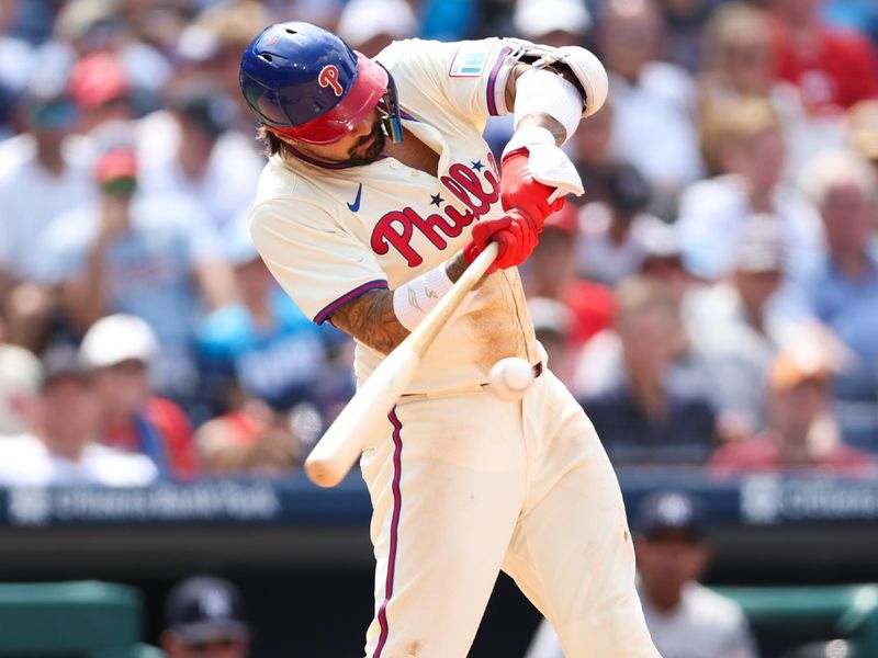 Jul 31, 2024; Philadelphia, Pennsylvania, USA;  Philadelphia Phillies outfielder Nick Castellanos (8) hits an RBI single during the eighth inning against the New York Yankees at Citizens Bank Park. Mandatory Credit: Bill Streicher-USA TODAY Sports