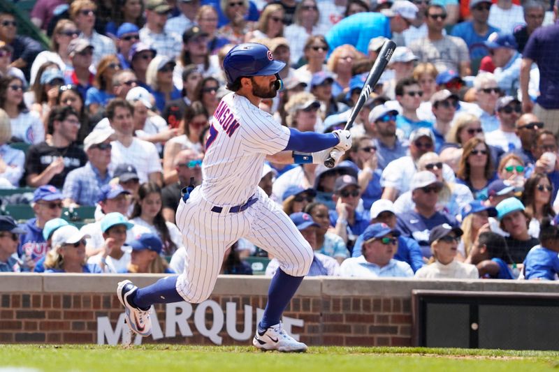 Jun 17, 2023; Chicago, Illinois, USA; Chicago Cubs shortstop Dansby Swanson (7) hits a single against the Baltimore Orioles during the fourth inning at Wrigley Field. Mandatory Credit: David Banks-USA TODAY Sports