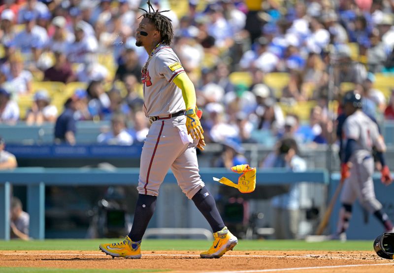 Sep 3, 2023; Los Angeles, California, USA;  Atlanta Braves right fielder Ronald Acuna Jr. (13) reacts after striking out in the third inning against the Los Angeles Dodgers at Dodger Stadium. Mandatory Credit: Jayne Kamin-Oncea-USA TODAY Sports