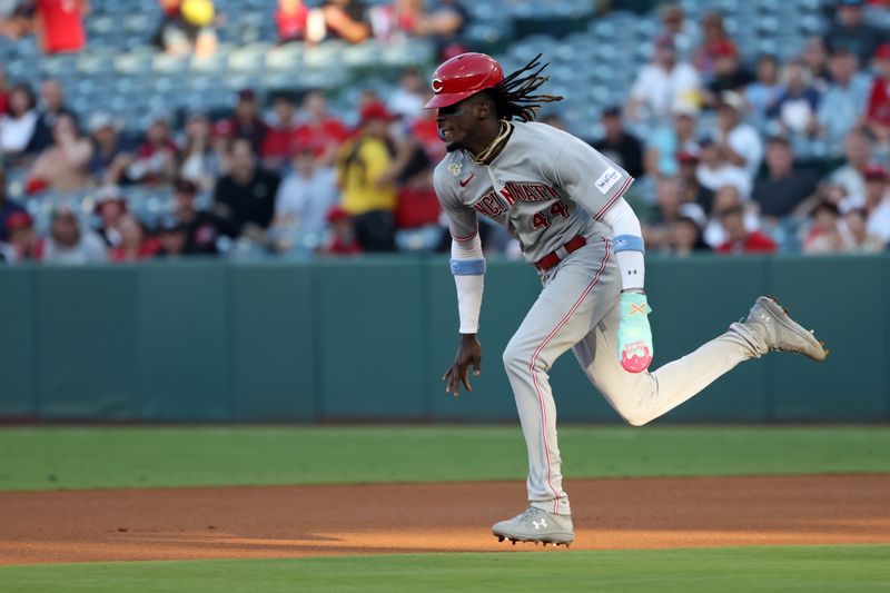 Aug 22, 2023; Anaheim, California, USA; Cincinnati Reds shortstop Elly De La Cruz (44) steals a second base during the first inning against the Los Angeles Angels at Angel Stadium. Mandatory Credit: Kiyoshi Mio-USA TODAY Sports