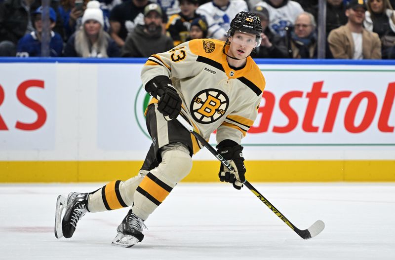 Dec 2, 2023; Toronto, Ontario, CAN; Boston Bruins forward Danton Heinen (43) pursues the play against the Toronto Maple Leafs in the second period at Scotiabank Arena. Mandatory Credit: Dan Hamilton-USA TODAY Sports