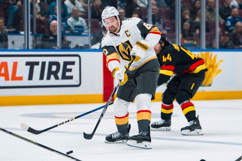 Apr 6, 2025; Vancouver, British Columbia, CAN; Vegas Golden Knights forward Mark Stone (61) makes a pass against the Vegas Golden Knights in the first period at Rogers Arena. Mandatory Credit: Bob Frid-Imagn Images