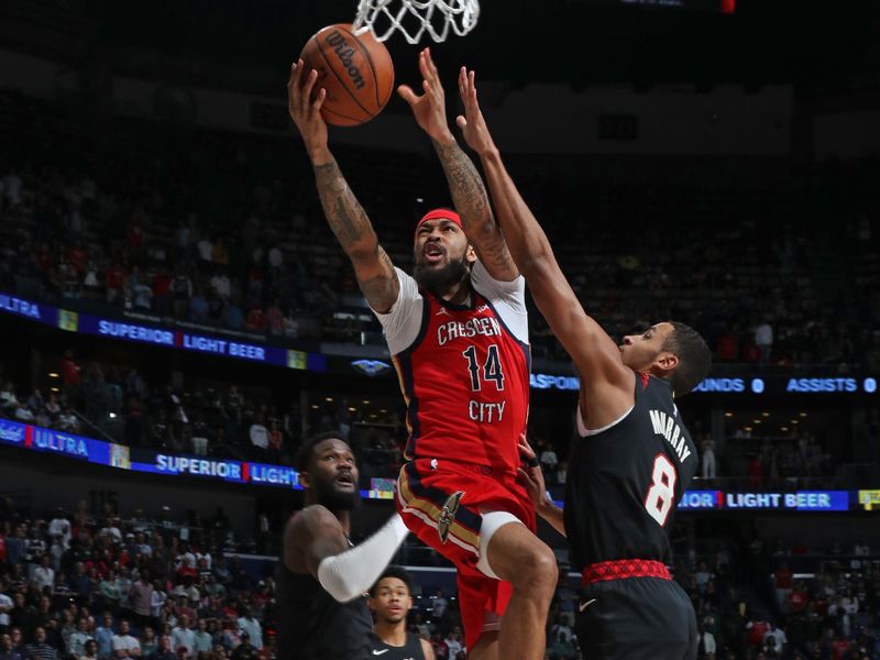 NEW ORLEANS, LA - MARCH 16: Brandon Ingram #14 of the New Orleans Pelicans drives to the basket during the game against the Portland Trail Blazers on March 16, 2024 at the Smoothie King Center in New Orleans, Louisiana. NOTE TO USER: User expressly acknowledges and agrees that, by downloading and or using this Photograph, user is consenting to the terms and conditions of the Getty Images License Agreement. Mandatory Copyright Notice: Copyright 2024 NBAE (Photo by Layne Murdoch Jr./NBAE via Getty Images)